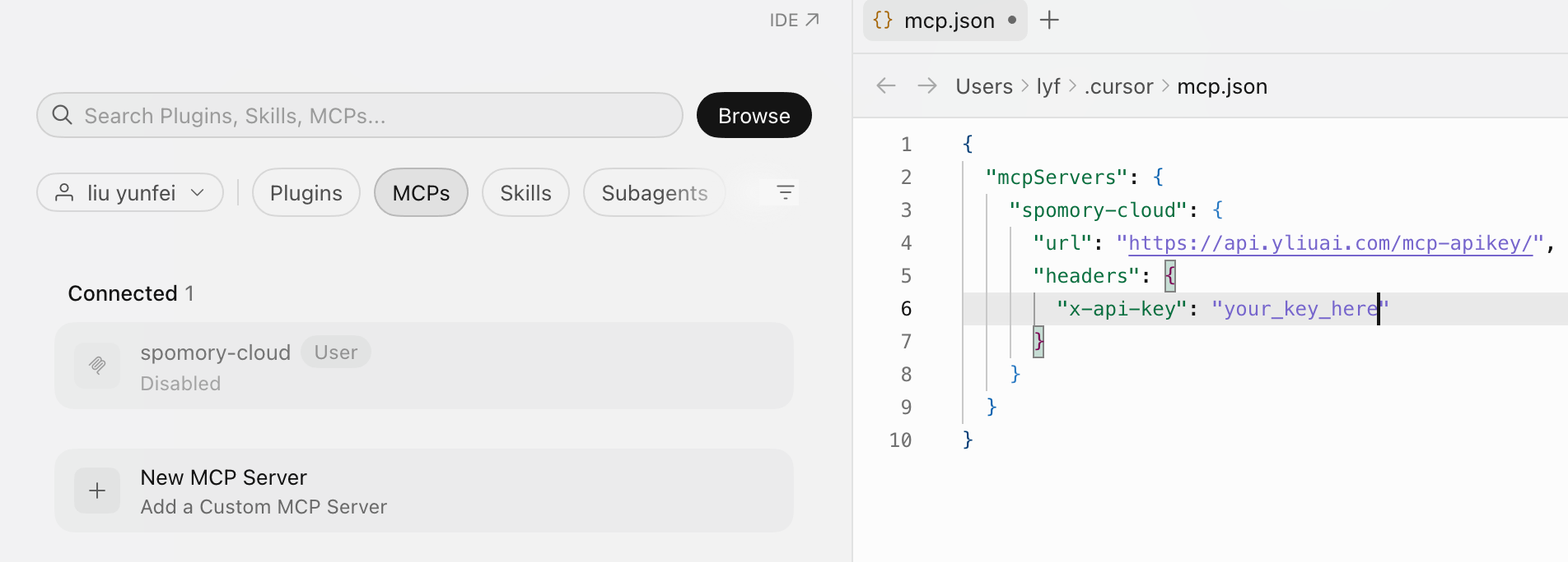 Cursor's mcp.json showing the remote connection's url and headers, with the API key redacted